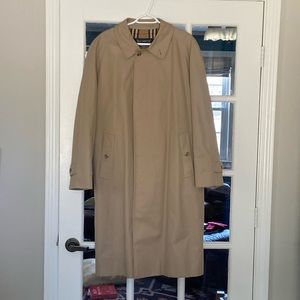 Authentic Burberry’s classic tan/khaki trench coat.